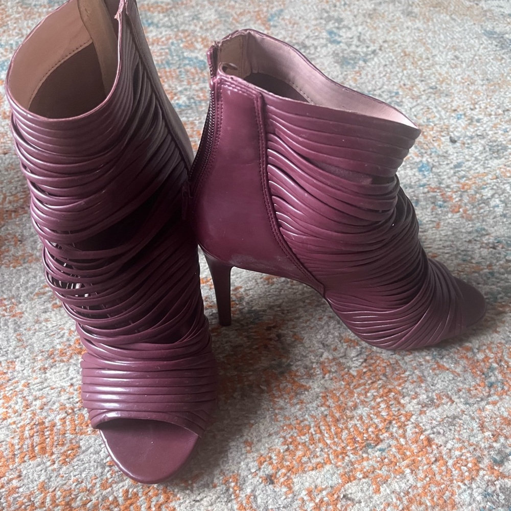 Two pair of sandals: burgundy and tan.